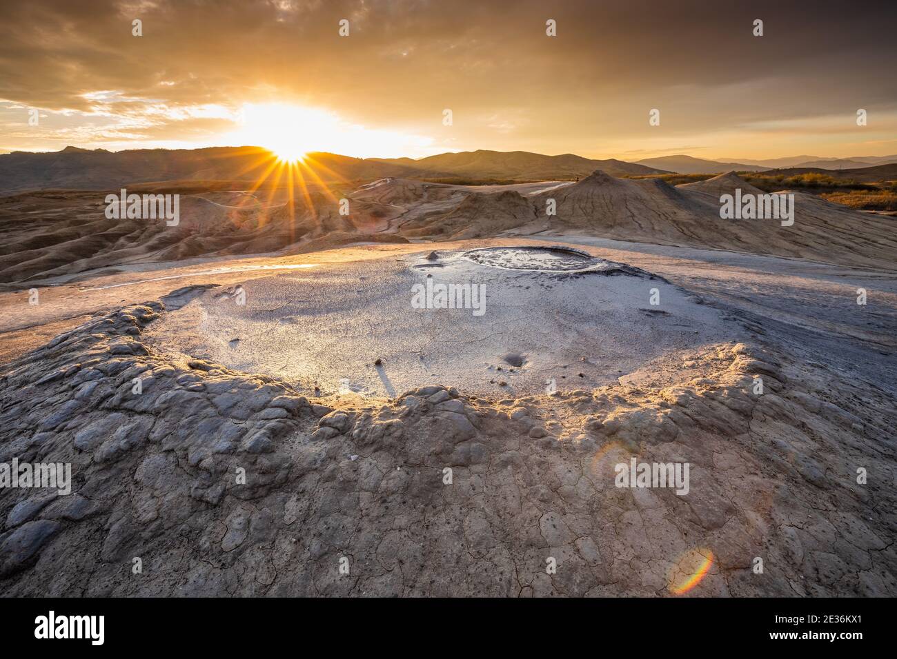 Muddy Volcanoes, Romania. Buzau County mud volcanoes at sunset. Stock Photo
