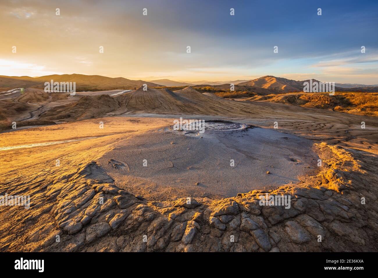 Muddy Volcanoes, Romania. Buzau County mud volcanoes at sunset. Stock Photo