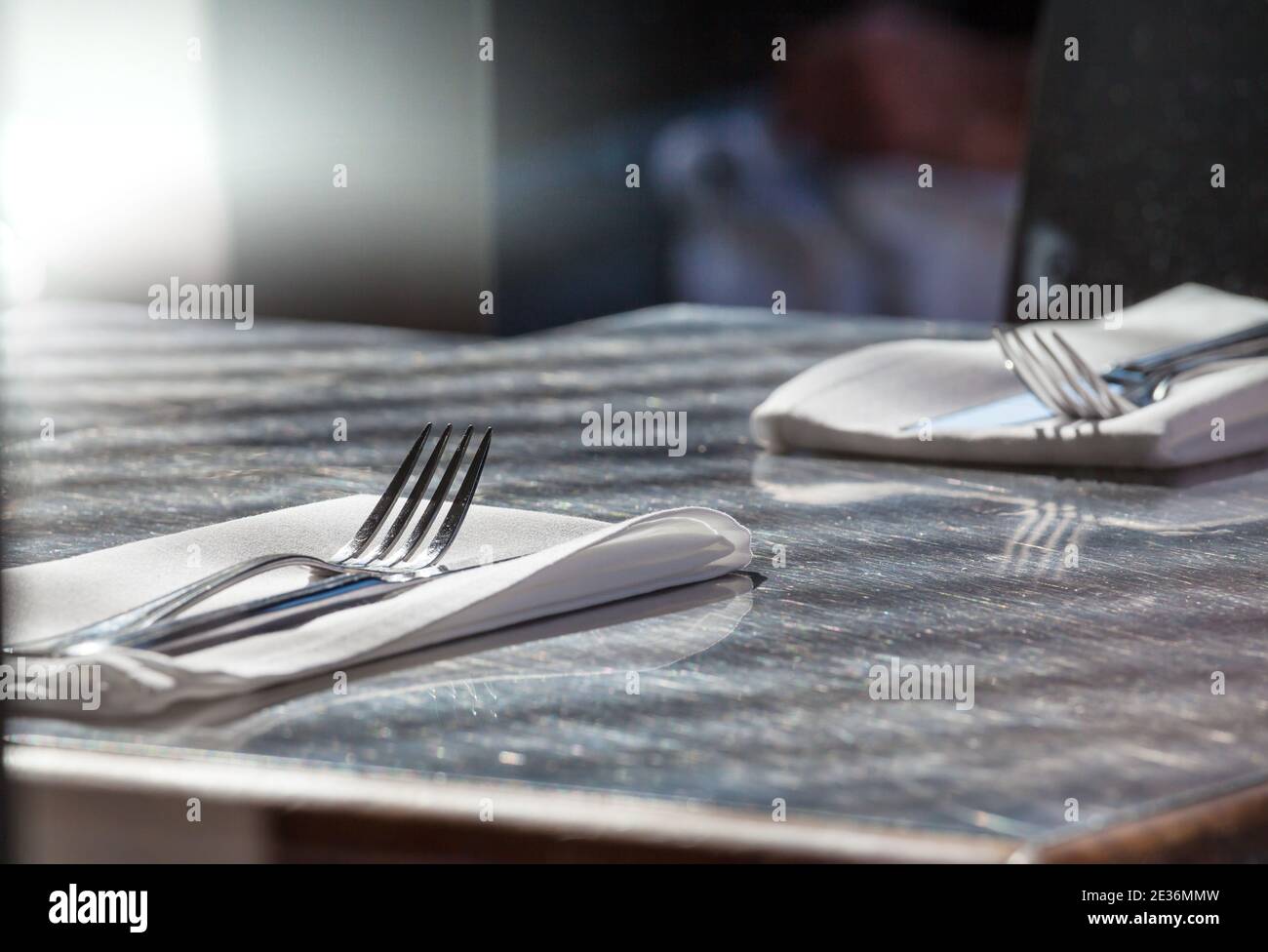 fork and knife on table in restaurant Stock Photo - Alamy