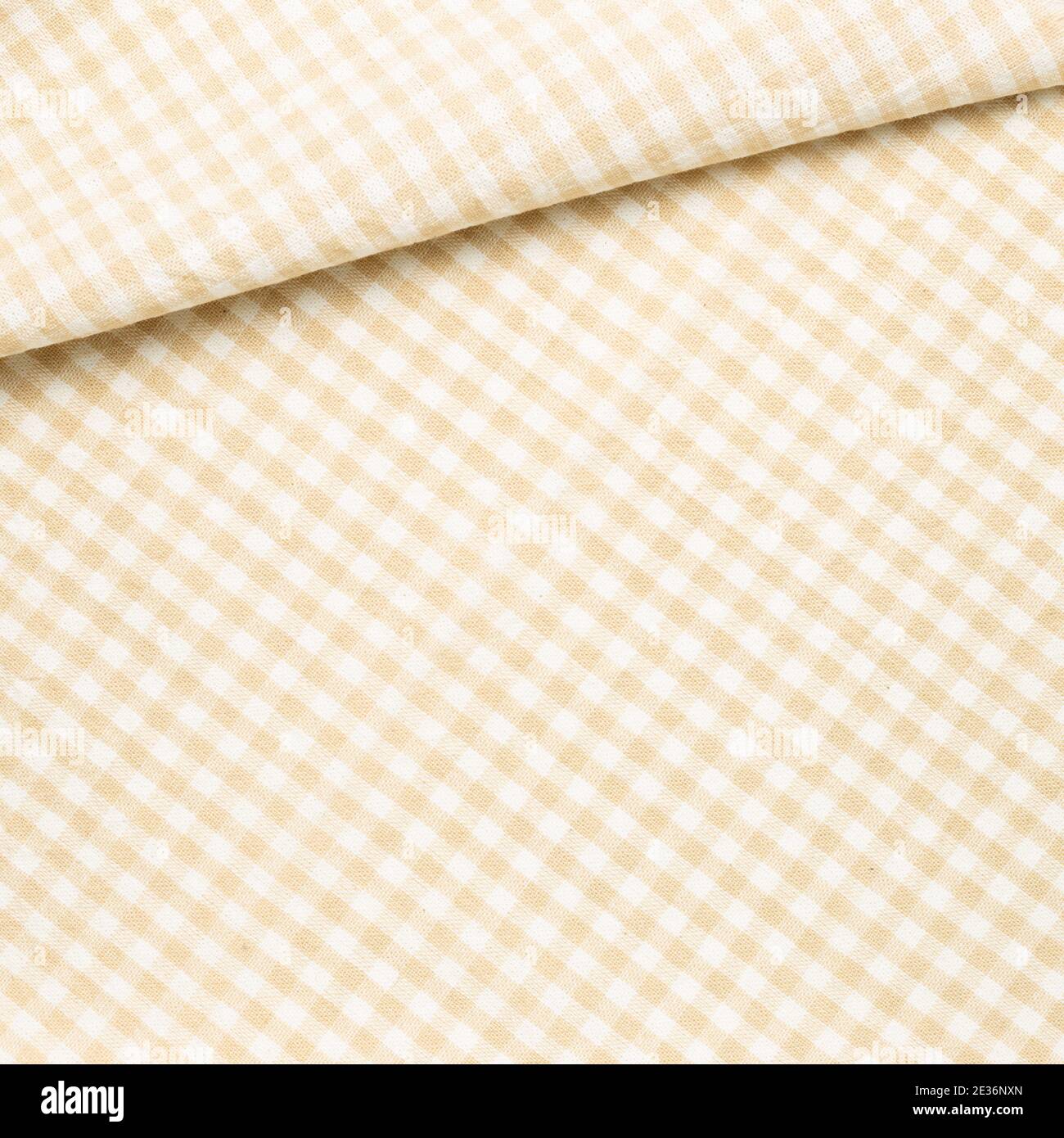 Crumpled beige check pattern fabric background Stock Photo - Alamy