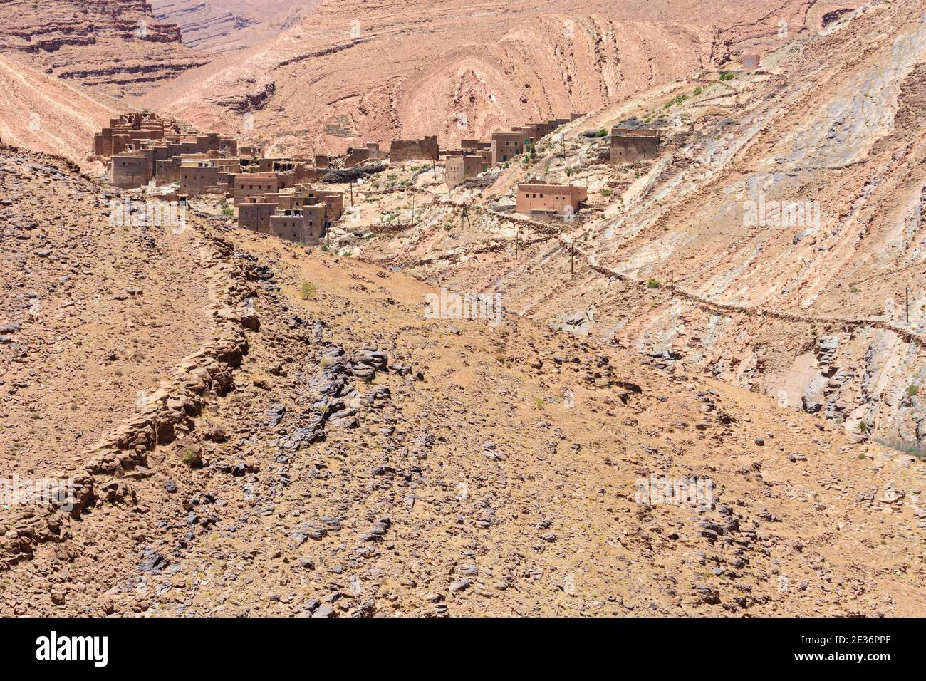 Village amidst geological formations in the High Atlas, Morocco. Stock Photo