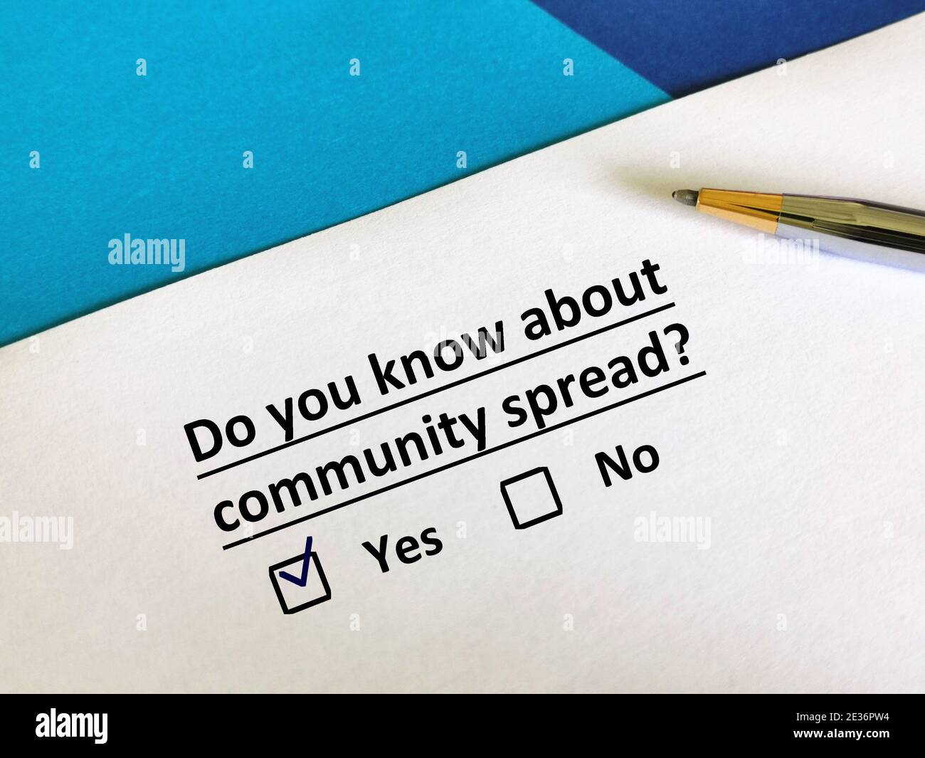 One person is answering question about pandemic.  He knows about community spread. Stock Photo