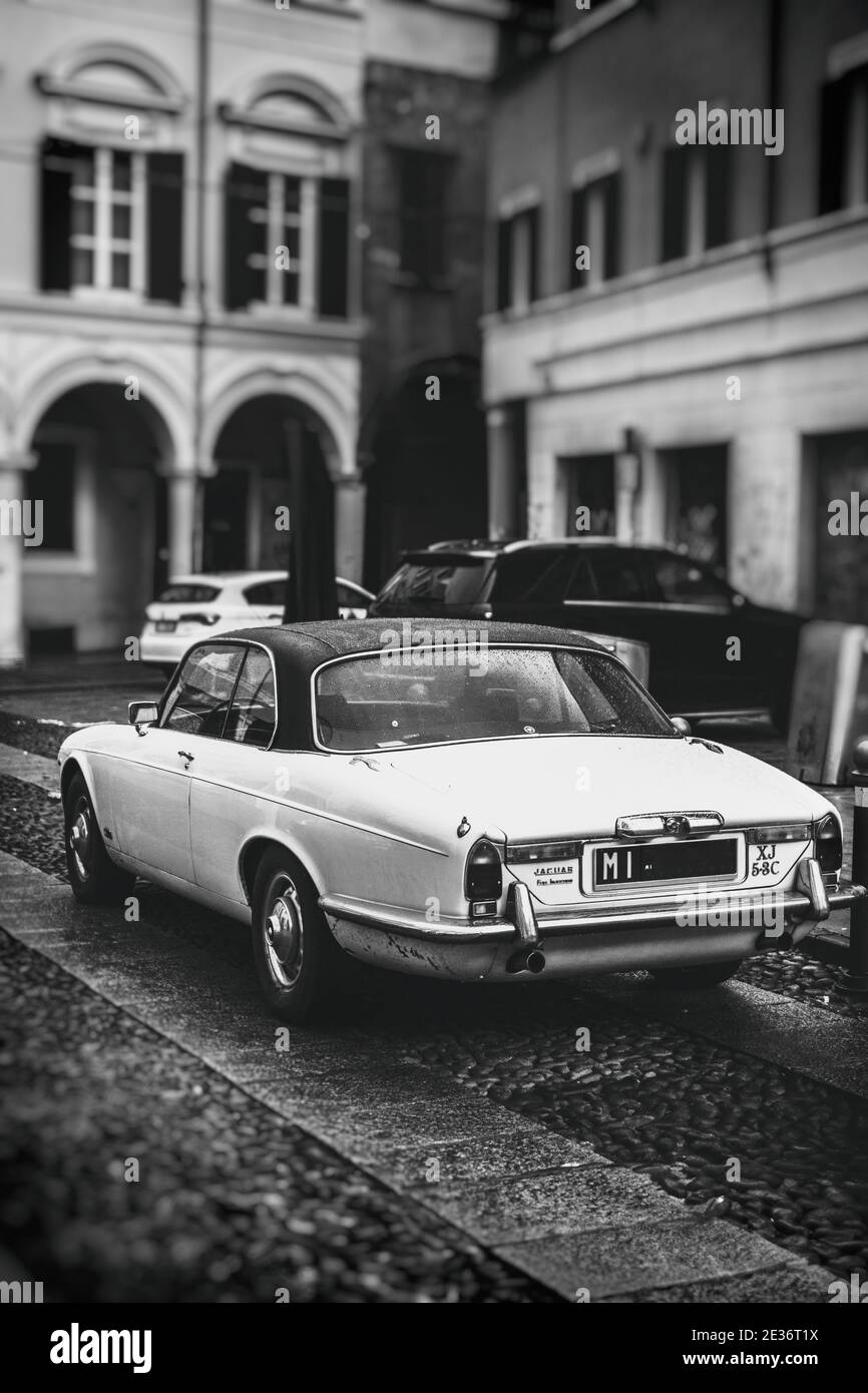 vintage jaguar car in vertical black and white background Stock Photo