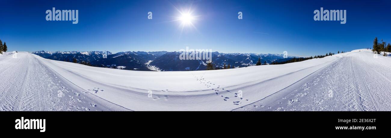 Picturesque winter panorama from the Rossbrand mountain with Tauern mountain range covered in snow Stock Photo