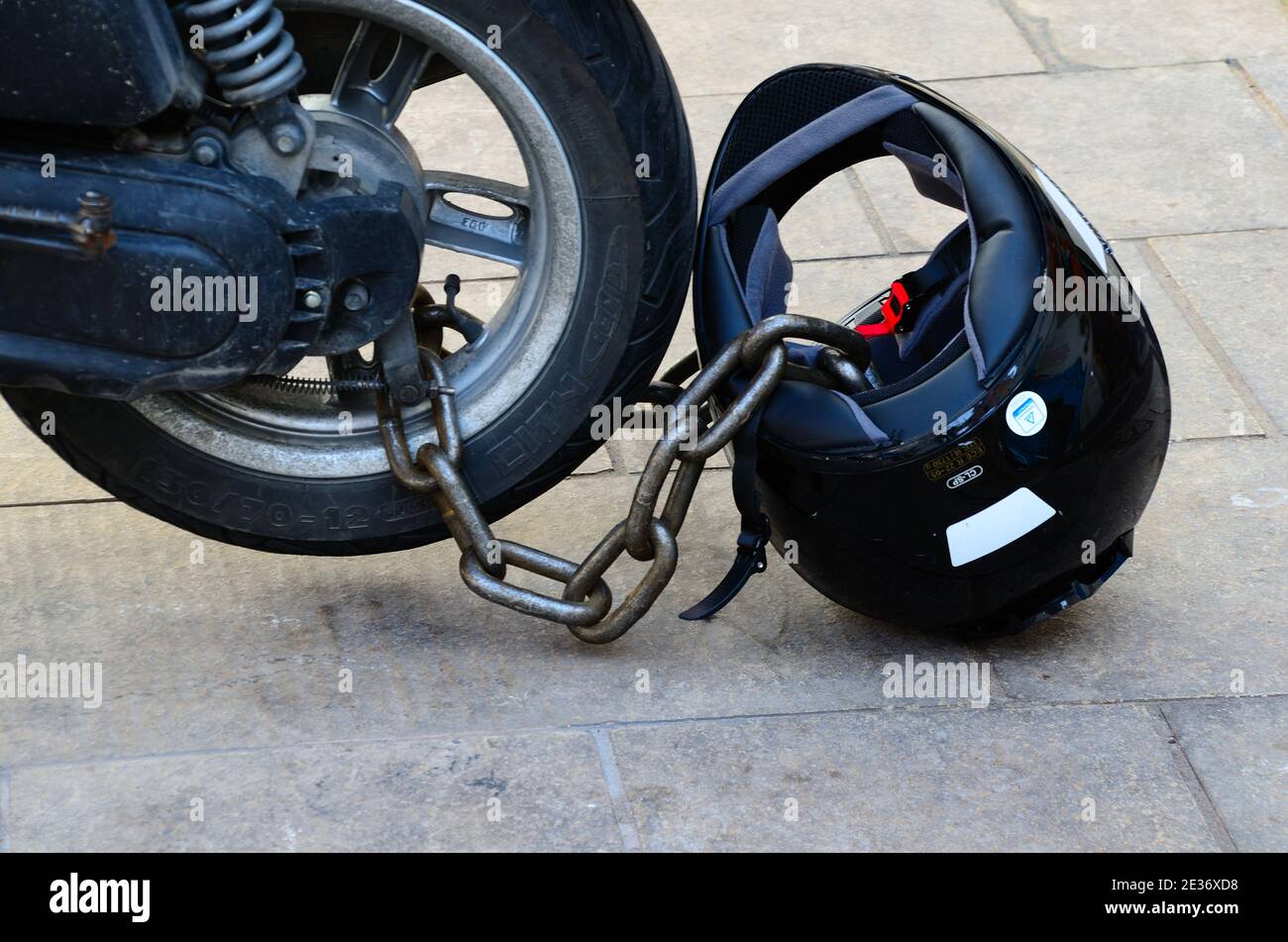 motorcycle helmet lock with chain in marseille Stock Photo Alamy