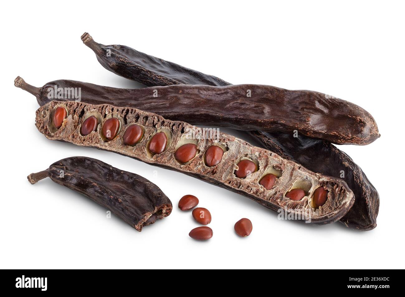 Ripe carob pods and bean isolated on white background with clipping