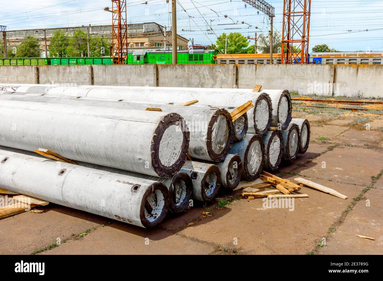 Crane lifting steel utility pole hires stock photography and images