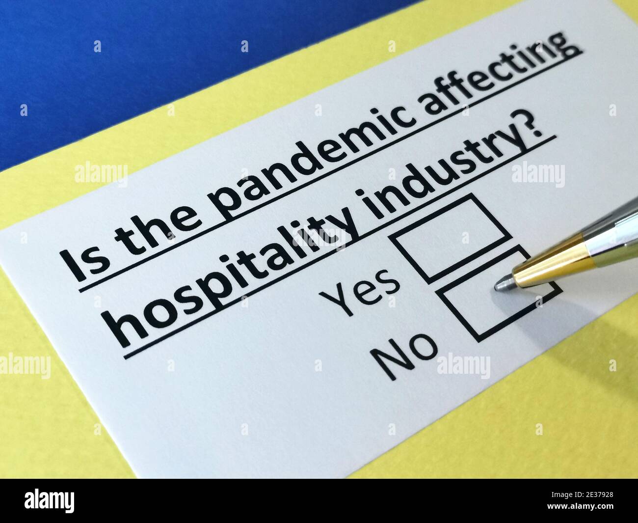 One person is answering question about pandemic effect on hospitality industry. Stock Photo