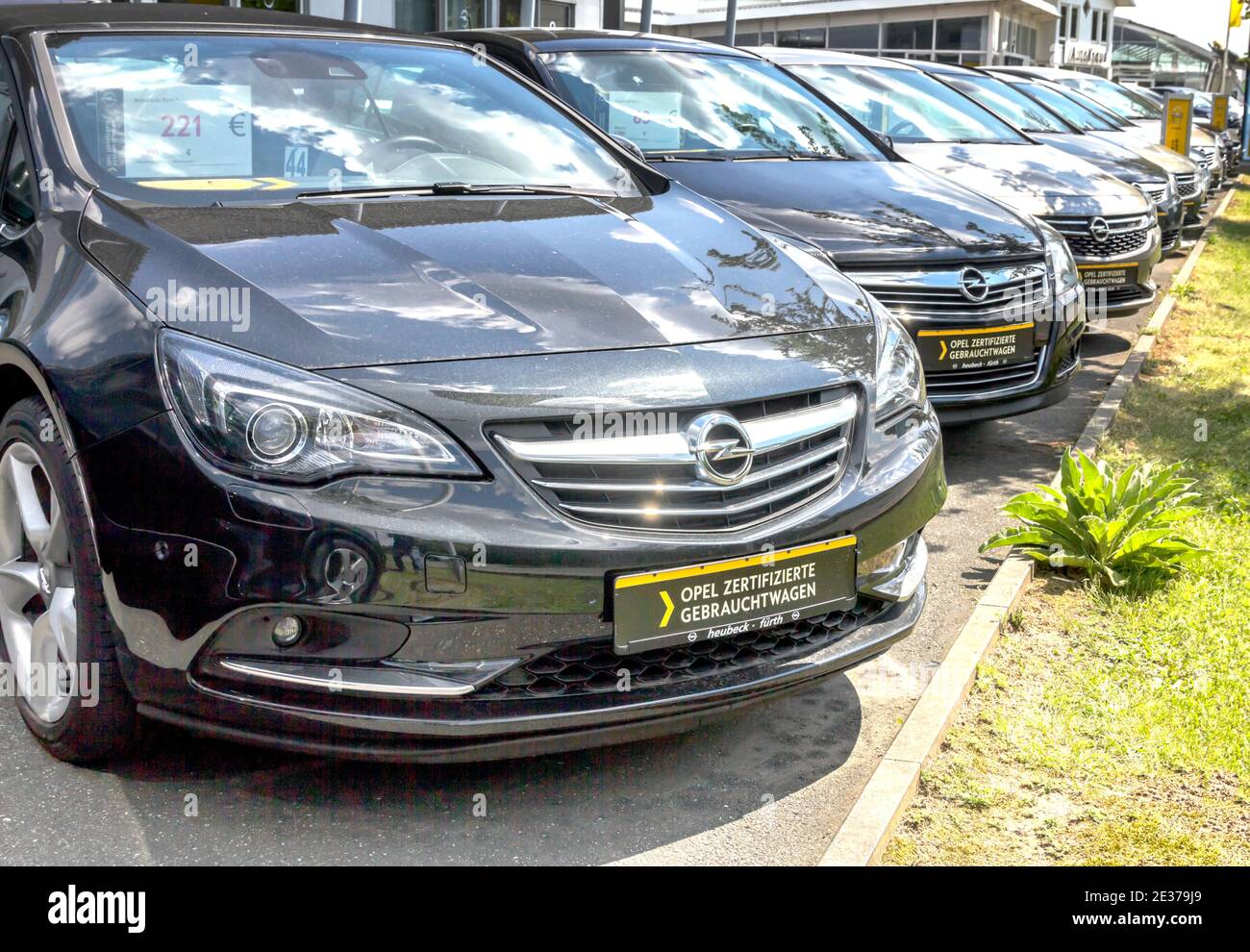 Nurnberg, Germany: Opel dealer, cars in row. Opel is a German automobile  manufacturer and part of the French Groupe PSA since August 2017 Stock  Photo - Alamy