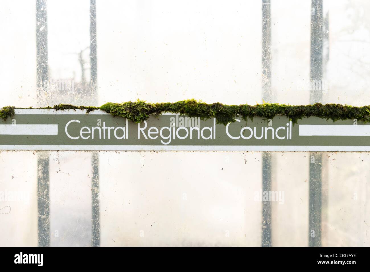 old Central Regional Council sign on side of bus shelter in what is now a Stirling council area - Scotland, UK Stock Photo