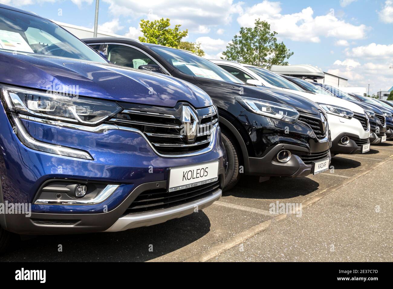 Furth, Germany: A row of modern Renault cars. Renault dealership center Stock Photo