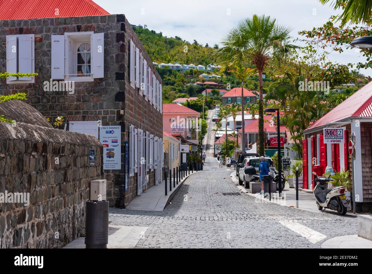 Gustavia, St Barths-- April 25, 2018. A pretty cobblestone street winds its  way through a shopping district in Gustavia, St. Barths. Editorial Use Onl  Stock Photo - Alamy