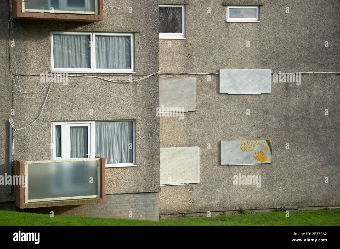 Windows boarded up on a condemned flat in Barne Barton, Plymouth Devon UK Stock Photo