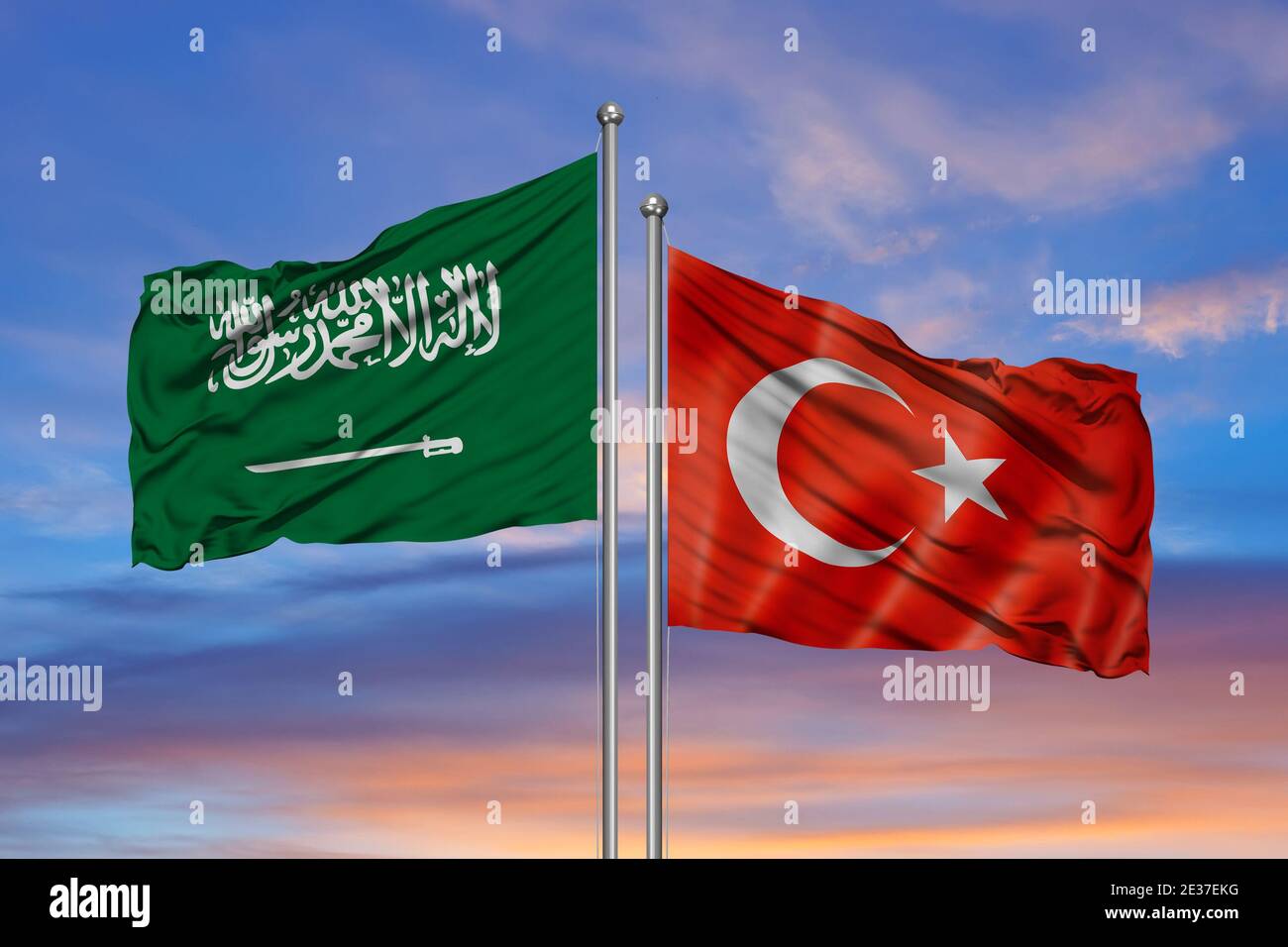 Turkey & Saudi Arabia Flags are waving in the sky with dark clouds