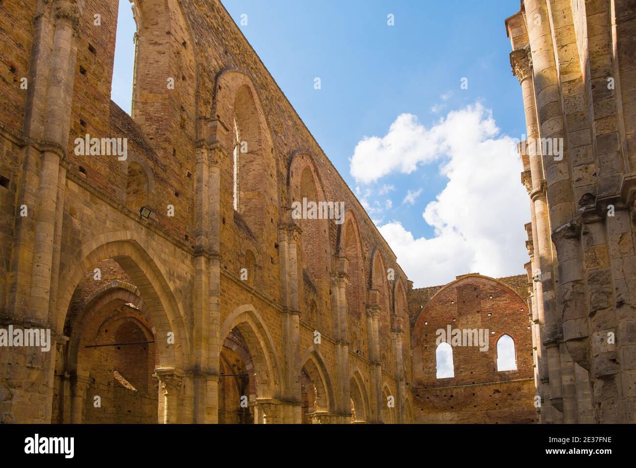 Chiusdino,Italy-7th Sept 2020.The roofless San Galgano Abbey ,Siena Province,Tuscany. Arch/radius windows at the top, lancet/pointed arches at bottom Stock Photo