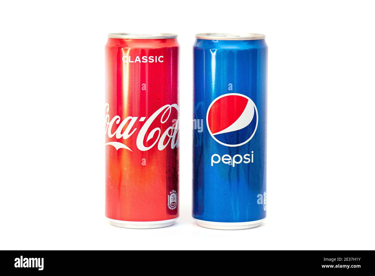 MOSCOW - JAN 15: Two cans with soft drinks Coca-Cola and Pepsi-Cola in new design isolated on white in Moscow, January 15. 2021 in Russia Stock Photo