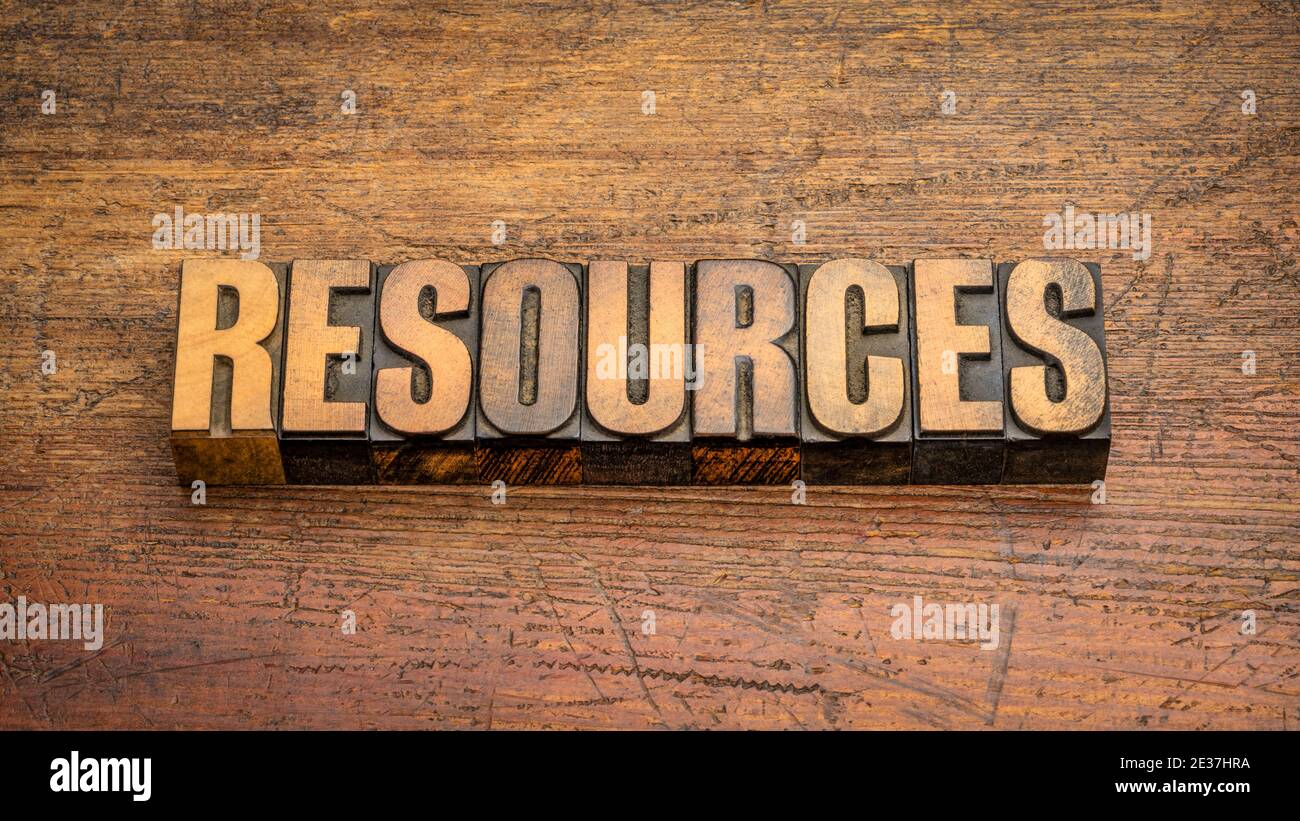 resources word abstract in vintage letterpress wood type against weathered wooden background, business, support and supply concept Stock Photo