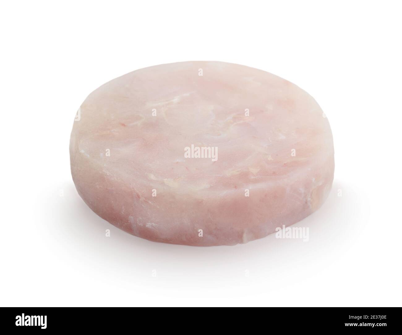 A fresh raw fishcake isolated on white. Stock Photo
