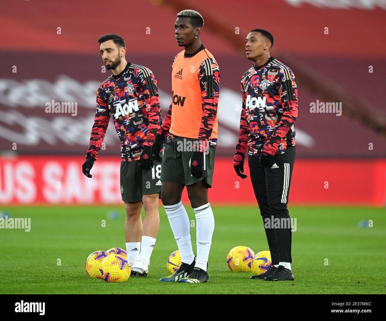 Manchester United's Bruno Fernandes, Paul Pogba and Anthony Martial warming  up before the Premier League match at Anfield, Liverpool Stock Photo - Alamy