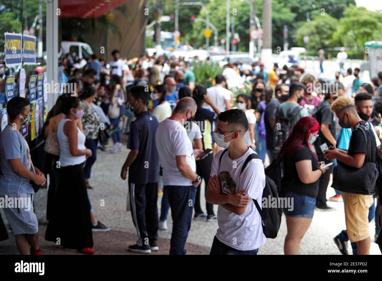 Students and their families gather before the beginning of the ENEM, Exame Nacional do Ensino Medio (National High School Exam), during the outbreak of the coronavirus disease (COVID-19), at UNIP Vergueiro test site in Sao Paulo, Brazil January 17, 2021. REUTERS/Amanda Perobelli Stock Photo