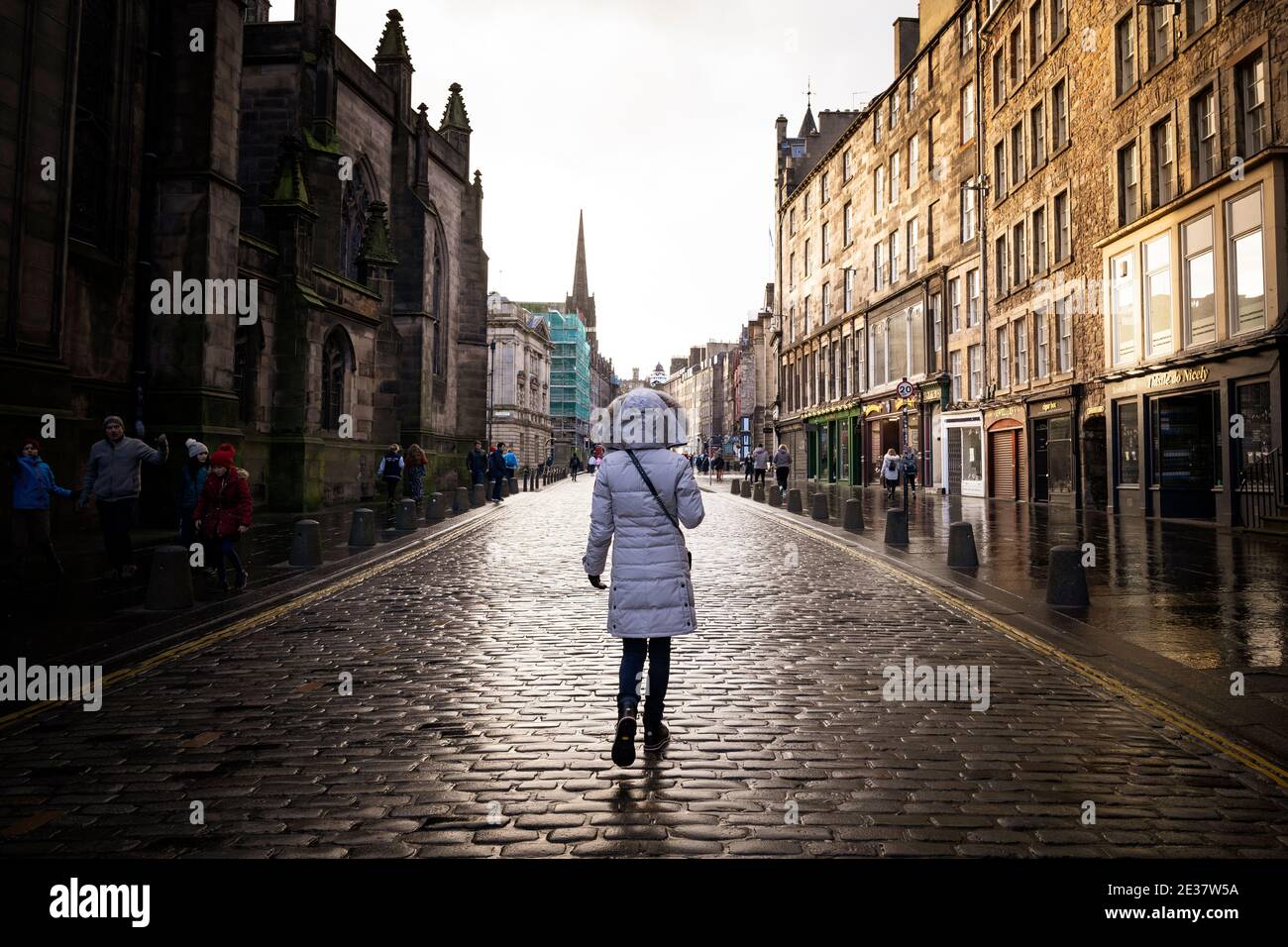 Edinburgh, Scotland, UK. 17 January 2021. On first Sunday after tightening of national lockdown rules in Scotland the streets of the Old town in Edinburgh City Centre remain very quiet with no shops open and only a couple of cafes offering takeaway drinks and food.   Iain Masterton/Alamy Live News Stock Photo