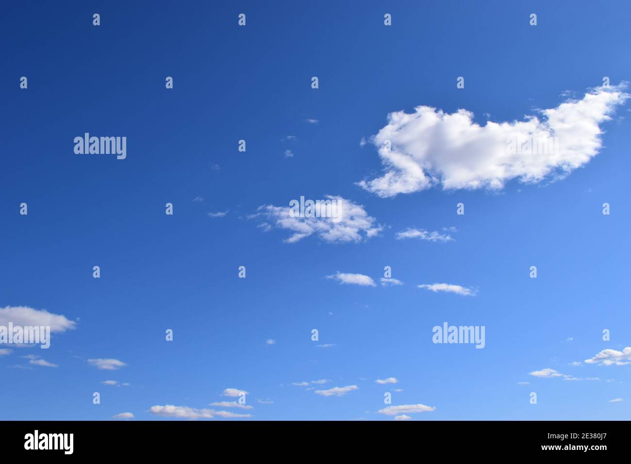 Blue sky and lots small clouds pattern. Deep blue sky and clouds Stock Photo