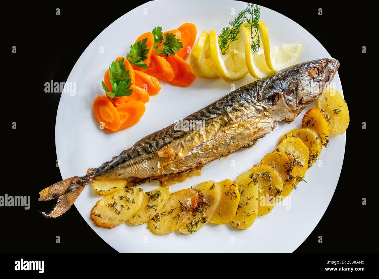 Beautifully served grilled fish dish, shot overhead Stock Photo Alamy