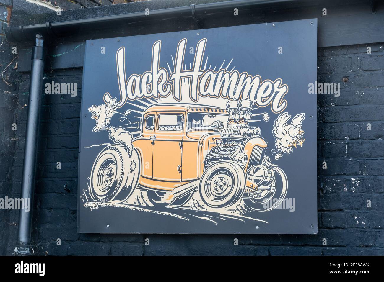 Jack Hammer sign on a hot rod car parts shop or store, UK Stock Photo
