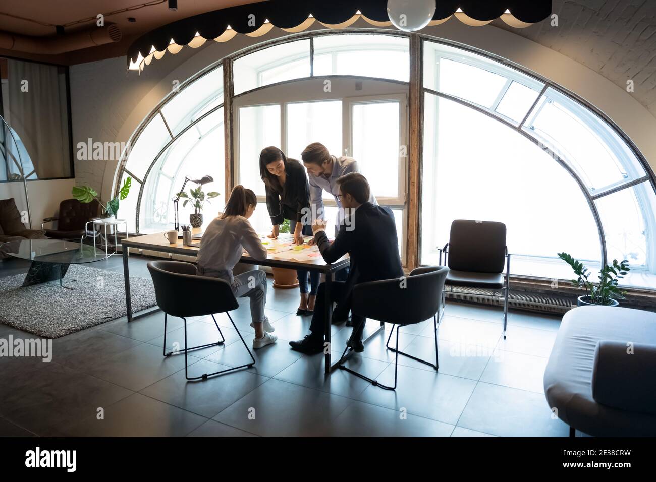 Diverse employees involved in hi-res stock photography and images - Alamy
