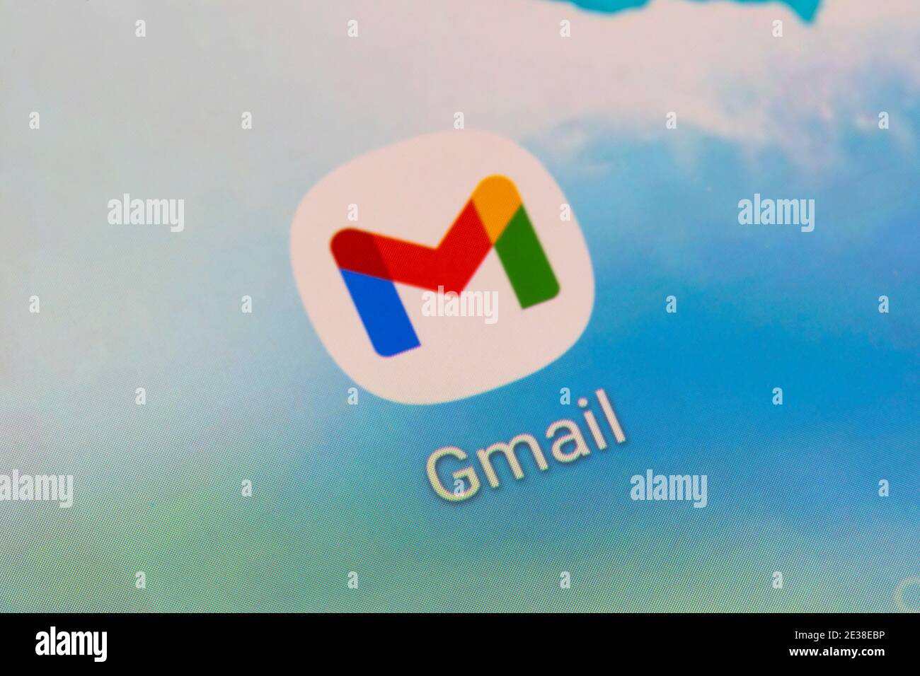 A closeup of the app logo for Gmail - a free email service developed by Google - on a smartphone screen Stock Photo