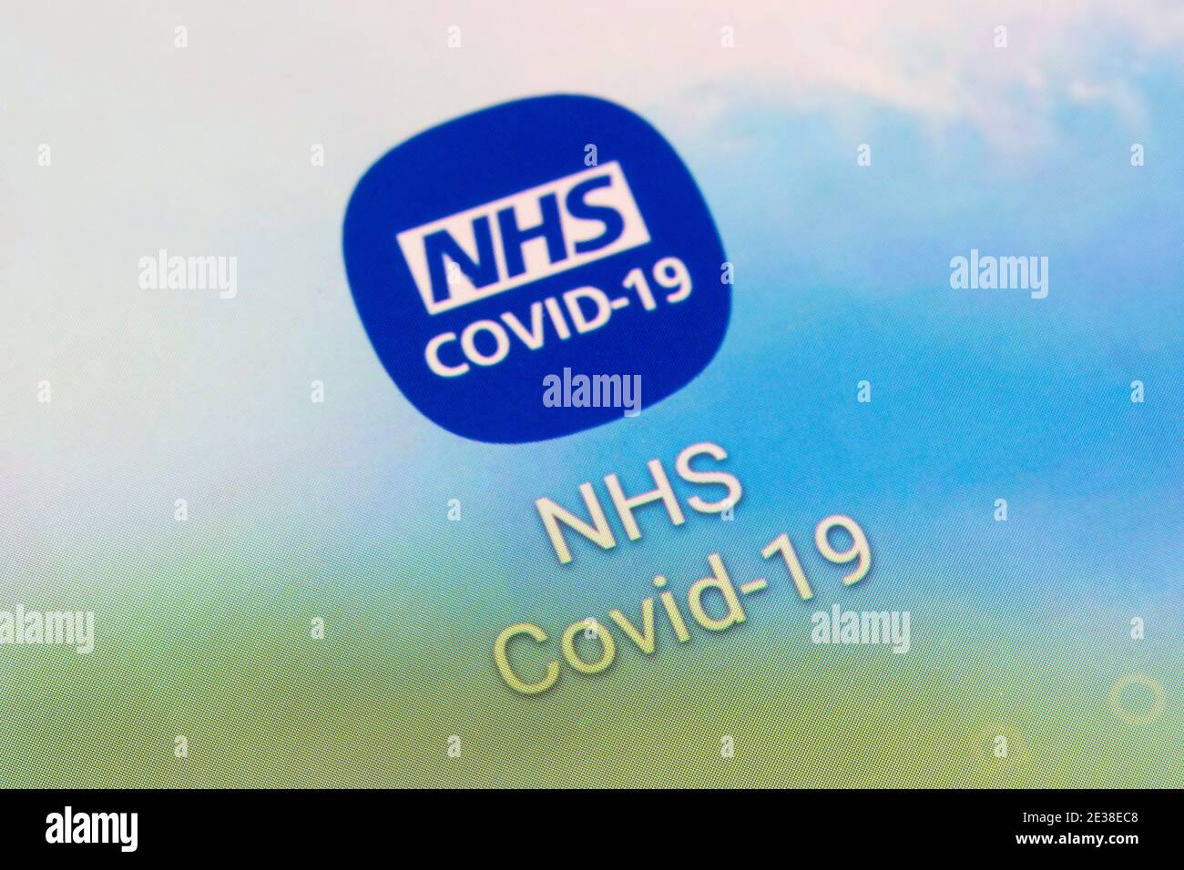 A closeup of the app logo for the NHS COVID-19 contact tracing app for monitoring the spread of the COVID-19 pandemic in England and Wales Stock Photo