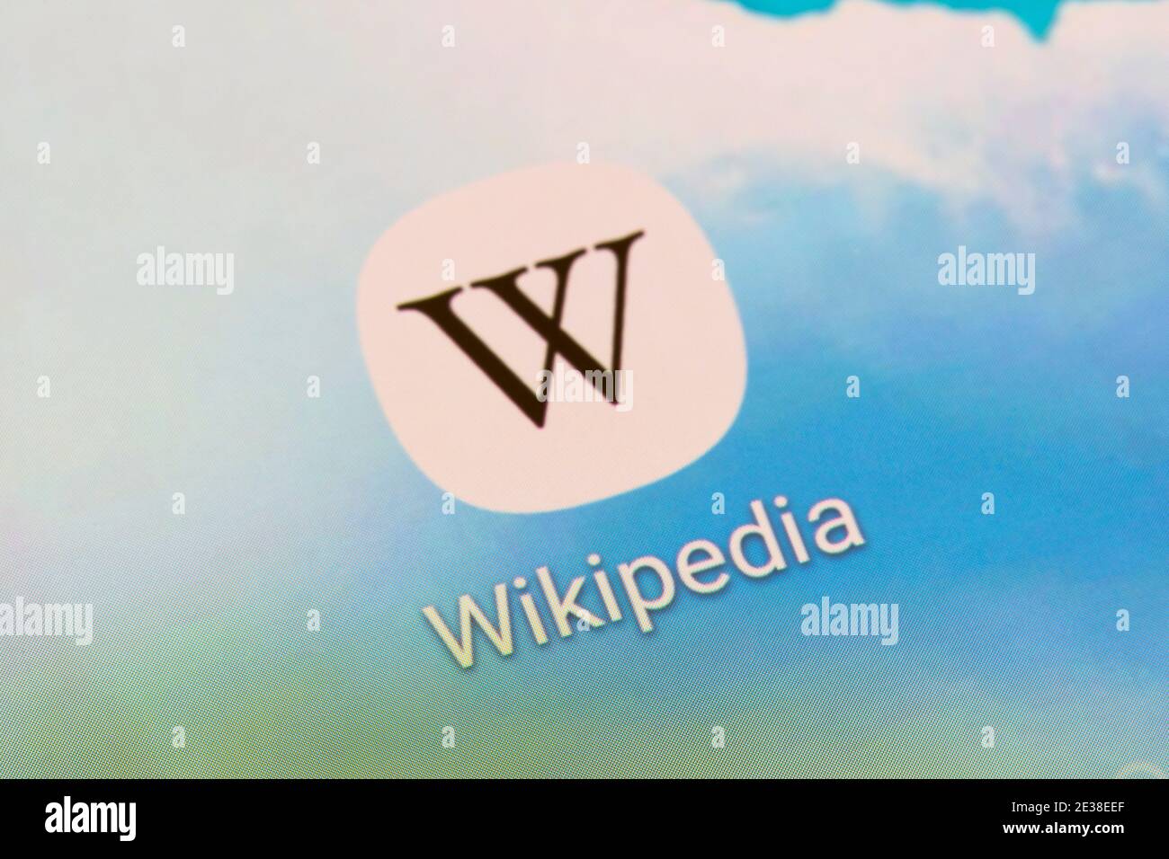 A closeup on the Wikipedia icon and logo on a smartphone screen. Wikipedia is a free online encyclopedia hosted by the Wikipedia foundation Stock Photo