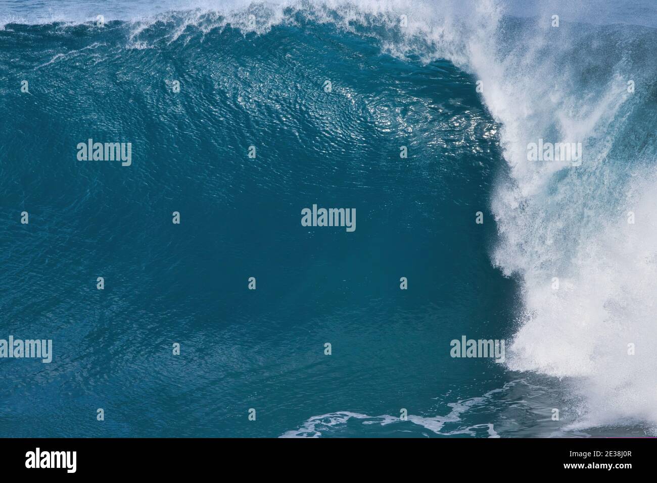 Large wave curling in on it's self. Stock Photo