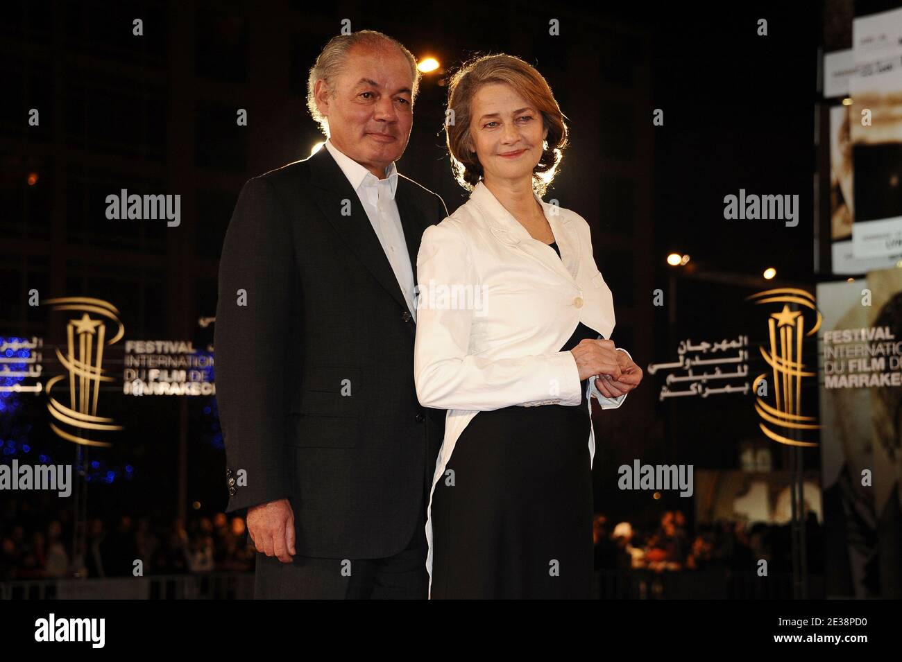 Jean-Noel Tassez and Charlotte Rampling arriving for the 10th 'Marrakesh  Film Festival' before the screening of 'Un Balcon sur la Mer' in Marrakech,  Morocco on December 4, 2010. Photo by Nicolas Briquet/ABACAPRESS.COM