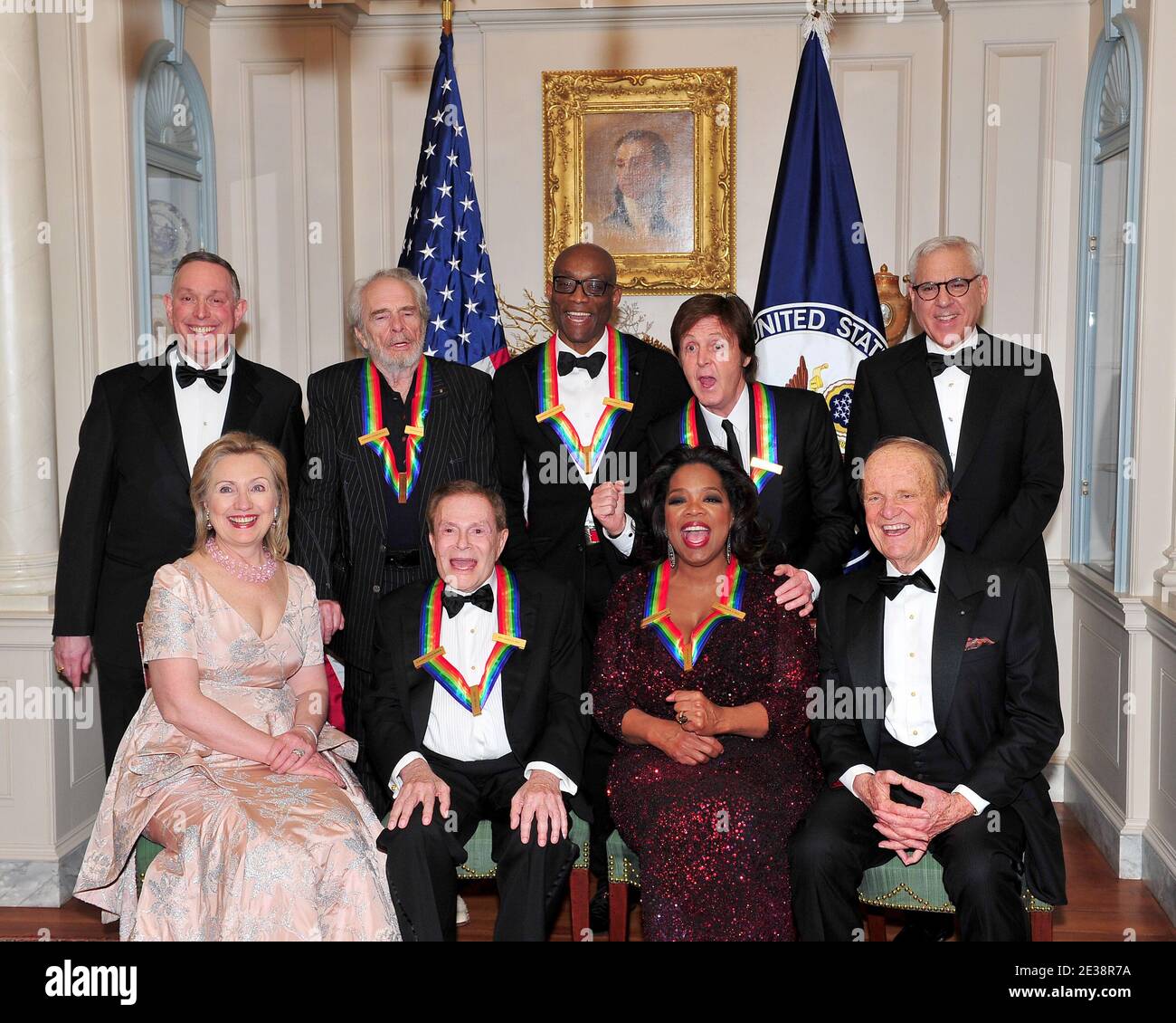 The 2010 Kennedy Center honorees (Top row, L-R) Michael M. Kaiser, President, John F. Kennedy Center for the Performing Arts; Merle Haggard; Bill T. Jones; Sir Paul McCartney; and David M. Rubenstein, Chairman, John F. Kennedy Center for the Performing Arts, (Bottom, L-R) United States Secretary of State Hillary Rodham Clinton; Jerry Herman; Oprah Winfrey; and George Stevens, Jr.pose for their formal class photo following the formal Artist's Dinner at the United States Department of State in Washington, D.C., USA on Saturday, December 4, 2010. Photo By Ron Sachs/ABACAPRESS.COM Stock Photo