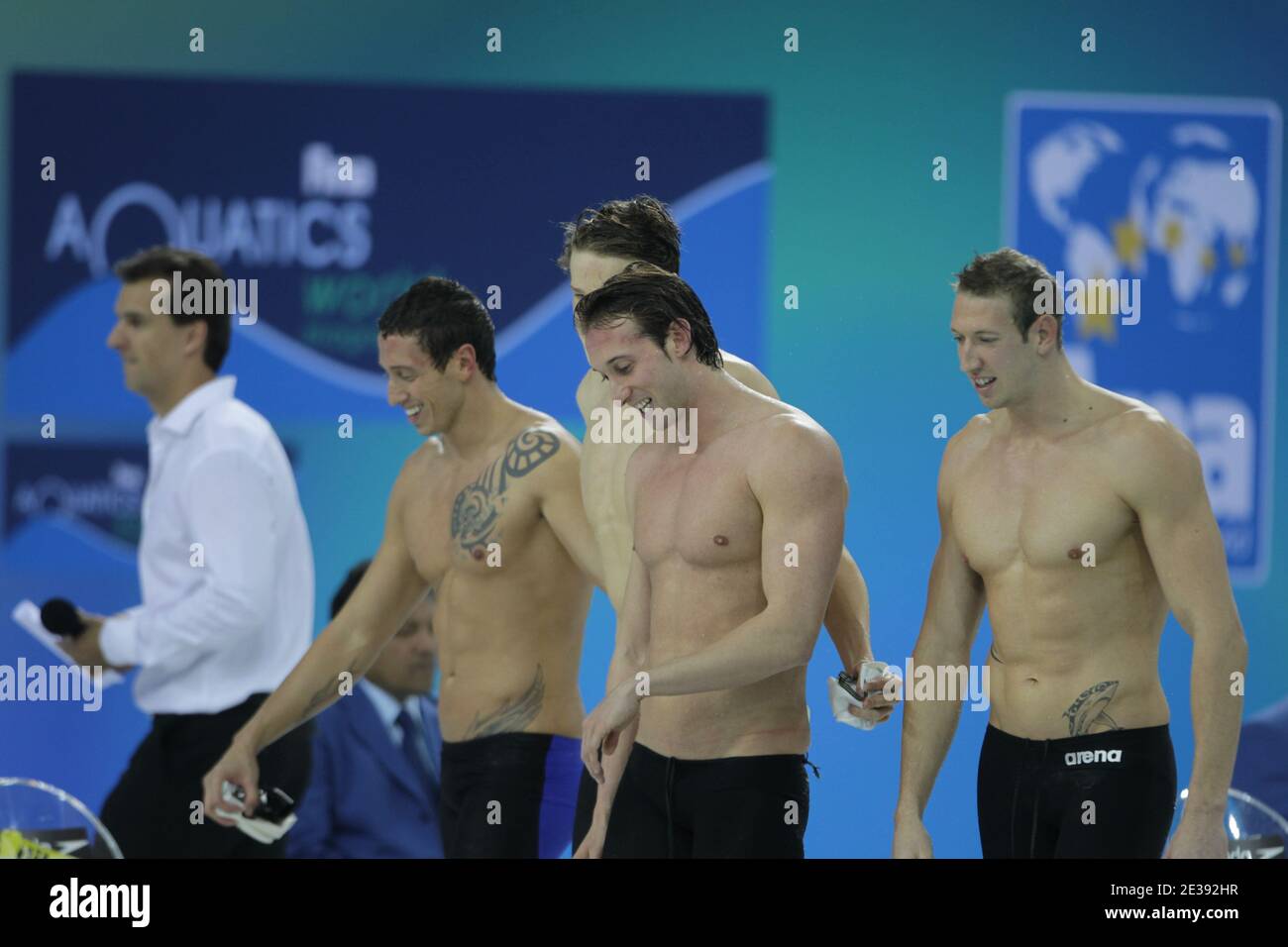 Alain Bernard, Frederick Bousquet, Fabien Gilot and Yannick Agnel of France celebrate after winning the Gold medals in the Men's 4Ax100m Freestyle final during day one of the 10th FINA World Swimming Championships (25m) at the Hamdan bin Mohammed bin Rashid Sports Complex in Dubai, United Arab Emirates on December 15, 2010. Photo by Ammar Abd Rabbo/ABACAPRESS.COM Stock Photo