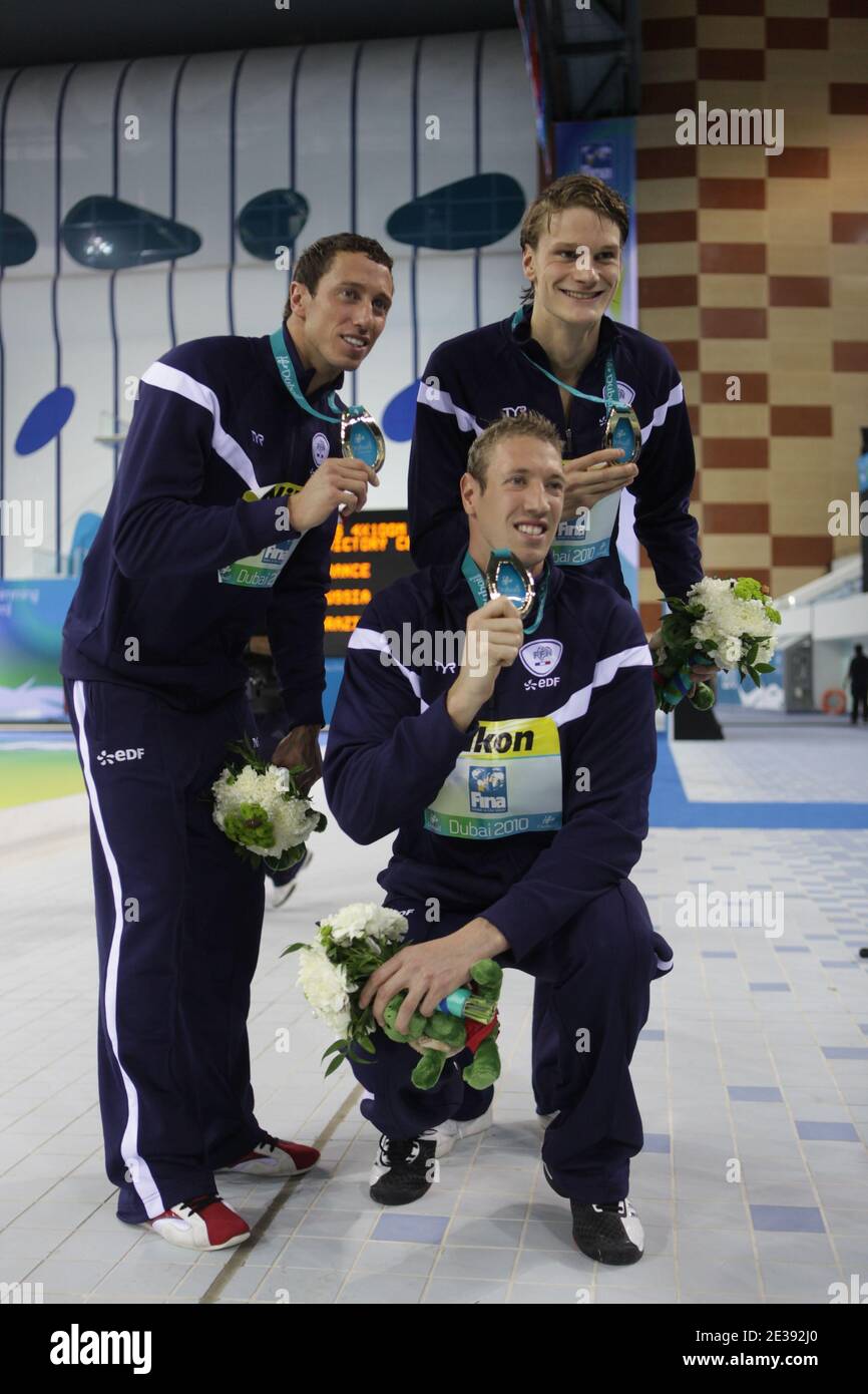 Alain Bernard, Frederick Bousquet, Fabien Gilot and Yannick Agnel of France pose with their Gold medal after winning the Men's 4Ax100m Freestyle final during day one of the 10th FINA World Swimming Championships (25m) at the Hamdan bin Mohammed bin Rashid Sports Complex in Dubai, United Arab Emirates on December 15, 2010. Photo by Ammar Abd Rabbo/ABACAPRESS.COM Stock Photo