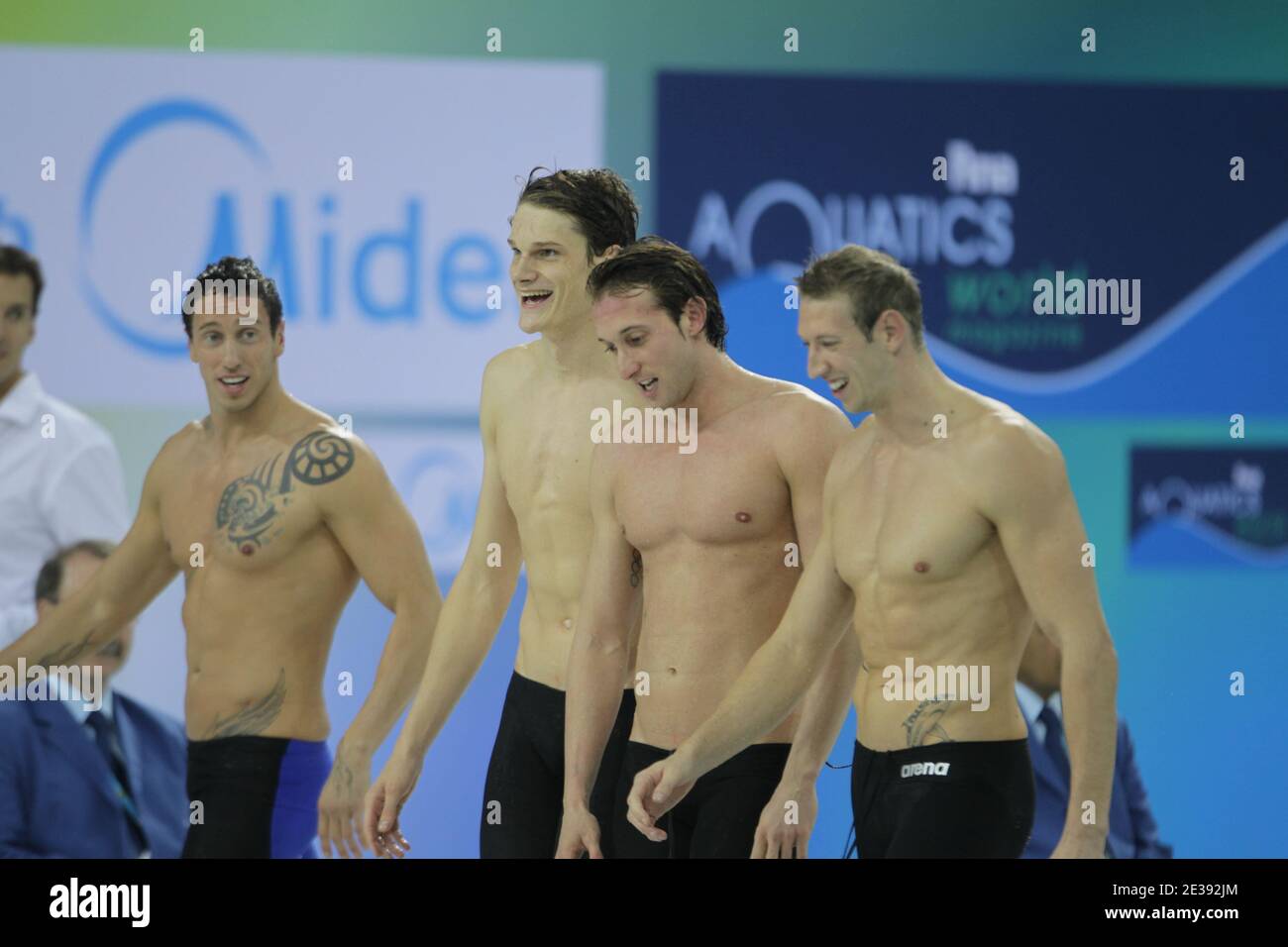 Alain Bernard, Frederick Bousquet, Fabien Gilot and Yannick Agnel of France celebrate after winning the Gold medals in the Men's 4Ax100m Freestyle final during day one of the 10th FINA World Swimming Championships (25m) at the Hamdan bin Mohammed bin Rashid Sports Complex in Dubai, United Arab Emirates on December 15, 2010. Photo by Ammar Abd Rabbo/ABACAPRESS.COM Stock Photo
