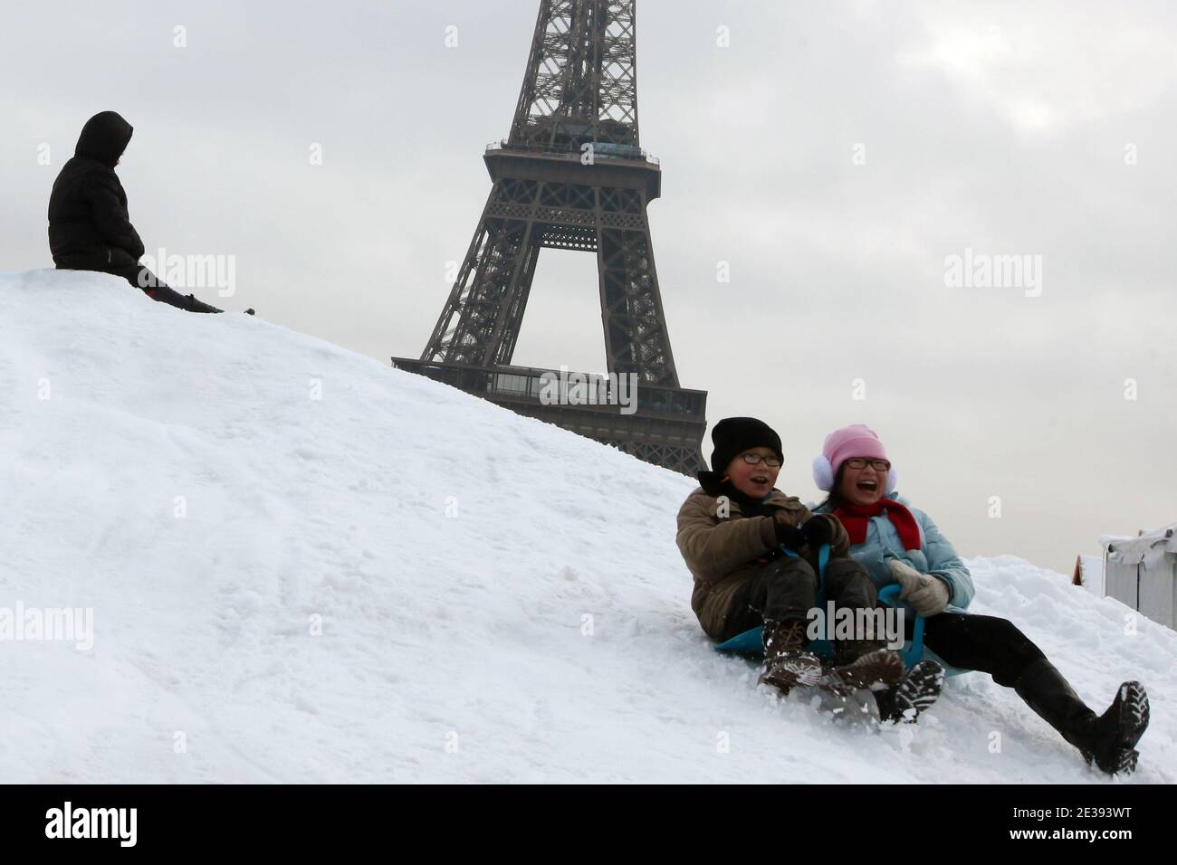 People enjoy ice skating on the snowcovered Trocadero gardens near the Eiffel Tower, in Paris, France on December 20, 2010 after heavy snowfalls. Photo by Stephane Lemouton/ABACAPRESS.COM Stock Photo