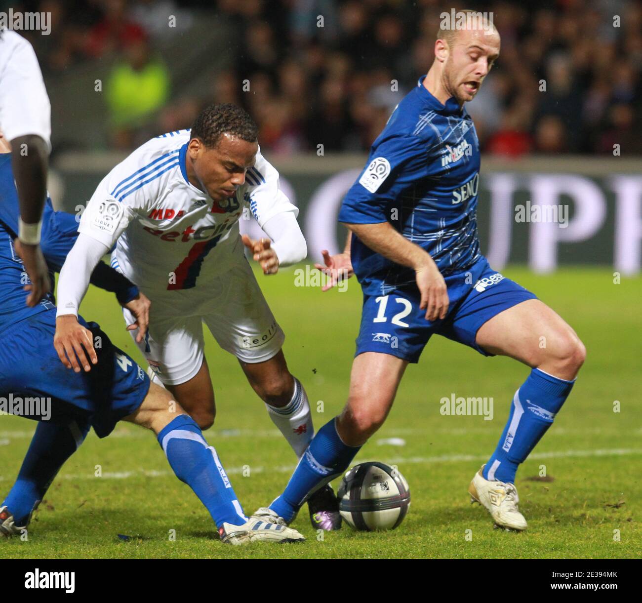 Lyon's Jimmy Briand and Auxerre Jean Pascal Mignot during the French First  League soccer match, Olympique Lyonnais vs AJ Auxerre at Gerland Stadium in  Lyon, France on December 22, 2010. The match