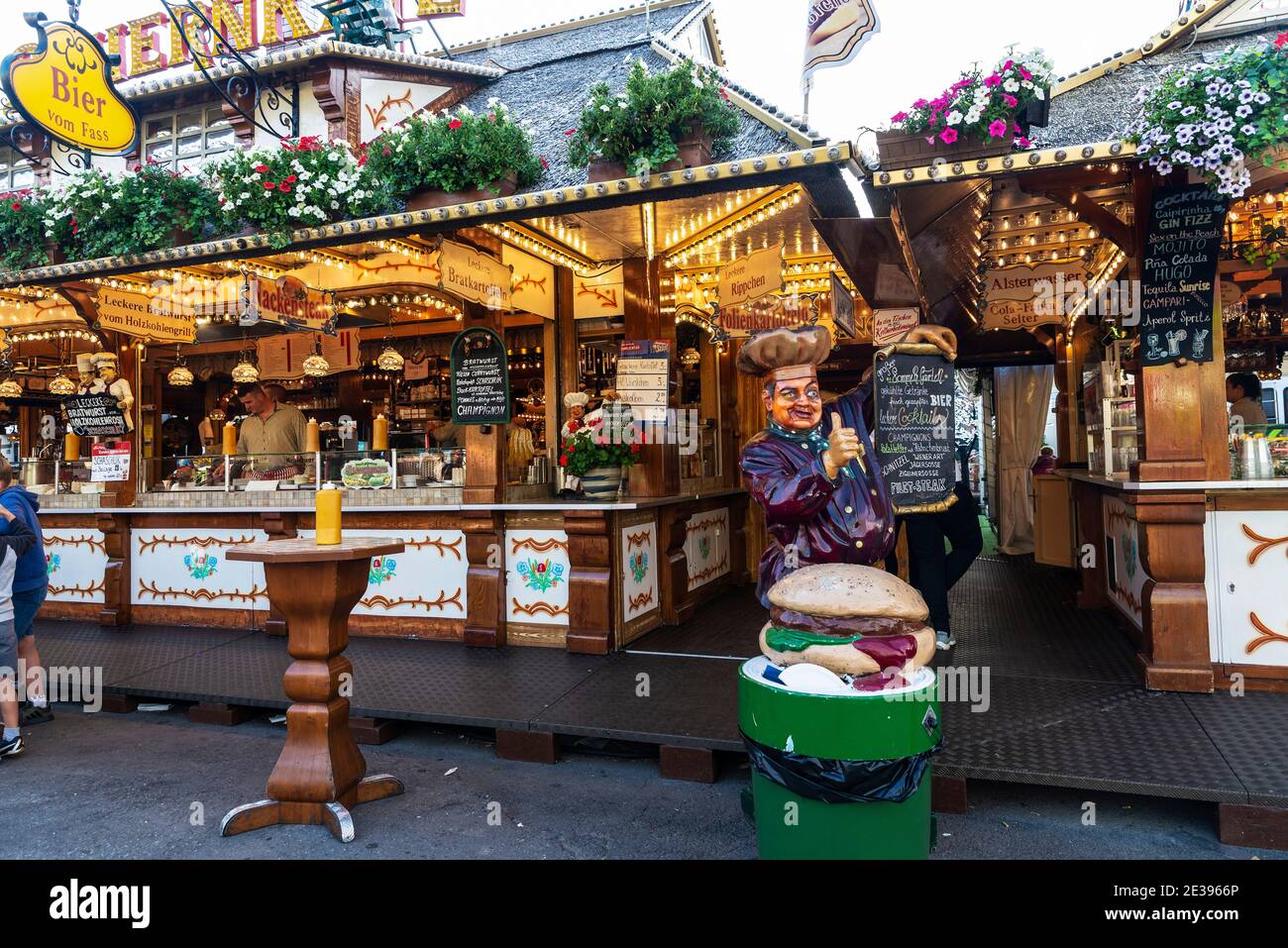 Hamburg, Germany - August 21, 2019: Burger restaurant with people around in the Hamburg DOM, amusement park on summer in Hamburg, Germany Stock Photo