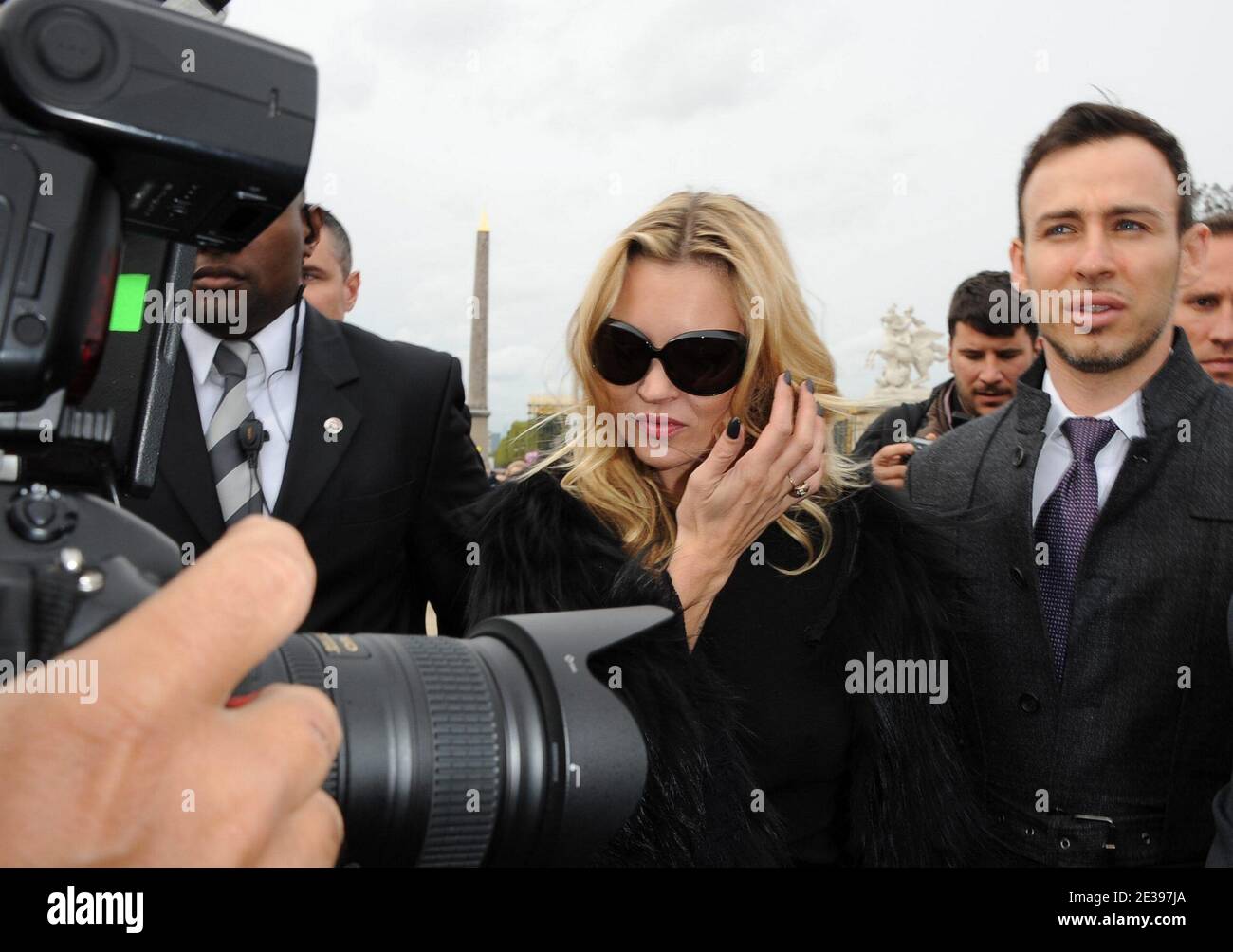 Kate Moss and Alexis Roche arriving for the Christian Dior fashion show ...