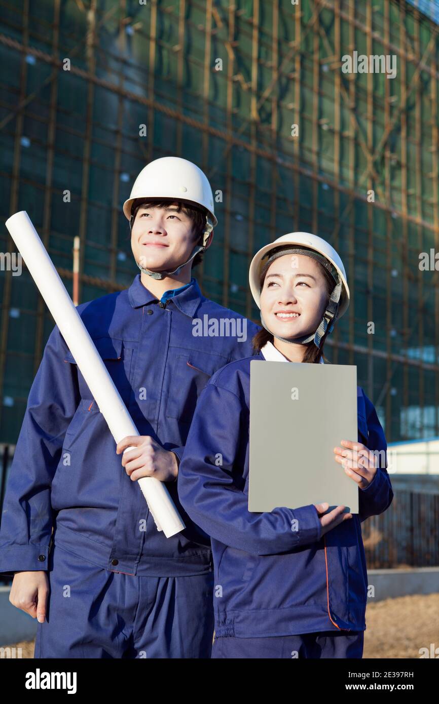 The Young Engineers working at construction field high quality photo ...