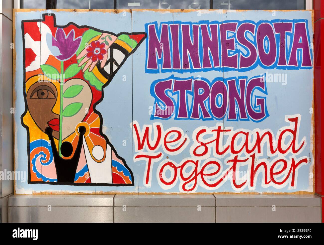 2020 painted mural on a boarded-up business window in Minneapolis, Minnesota during the 2020 civil unrest after the killing of George Floyd Stock Photo
