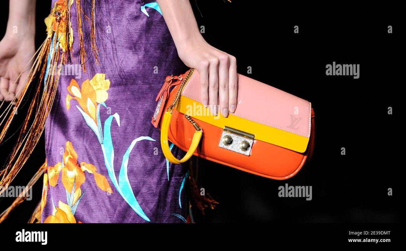A model holds a handbag designed by Marc Jacobs for Louis Vuitton  spring-summer 2011 Ready-to-Wear collection show held at the Cour Carree du  Louvre in Paris, France on October 6, 2010. Photo
