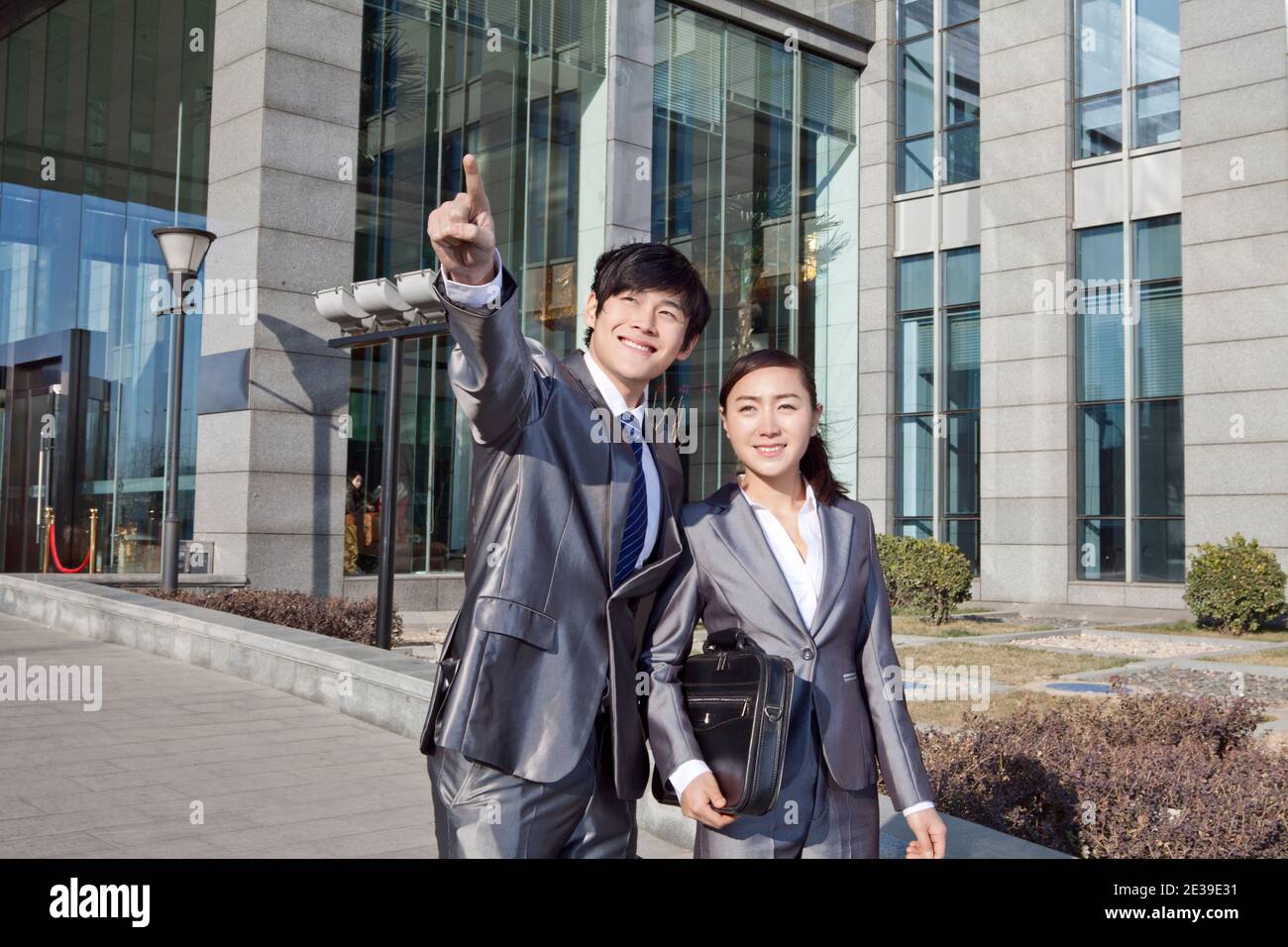 Business man and business woman walking to work high quality photo Stock Photo