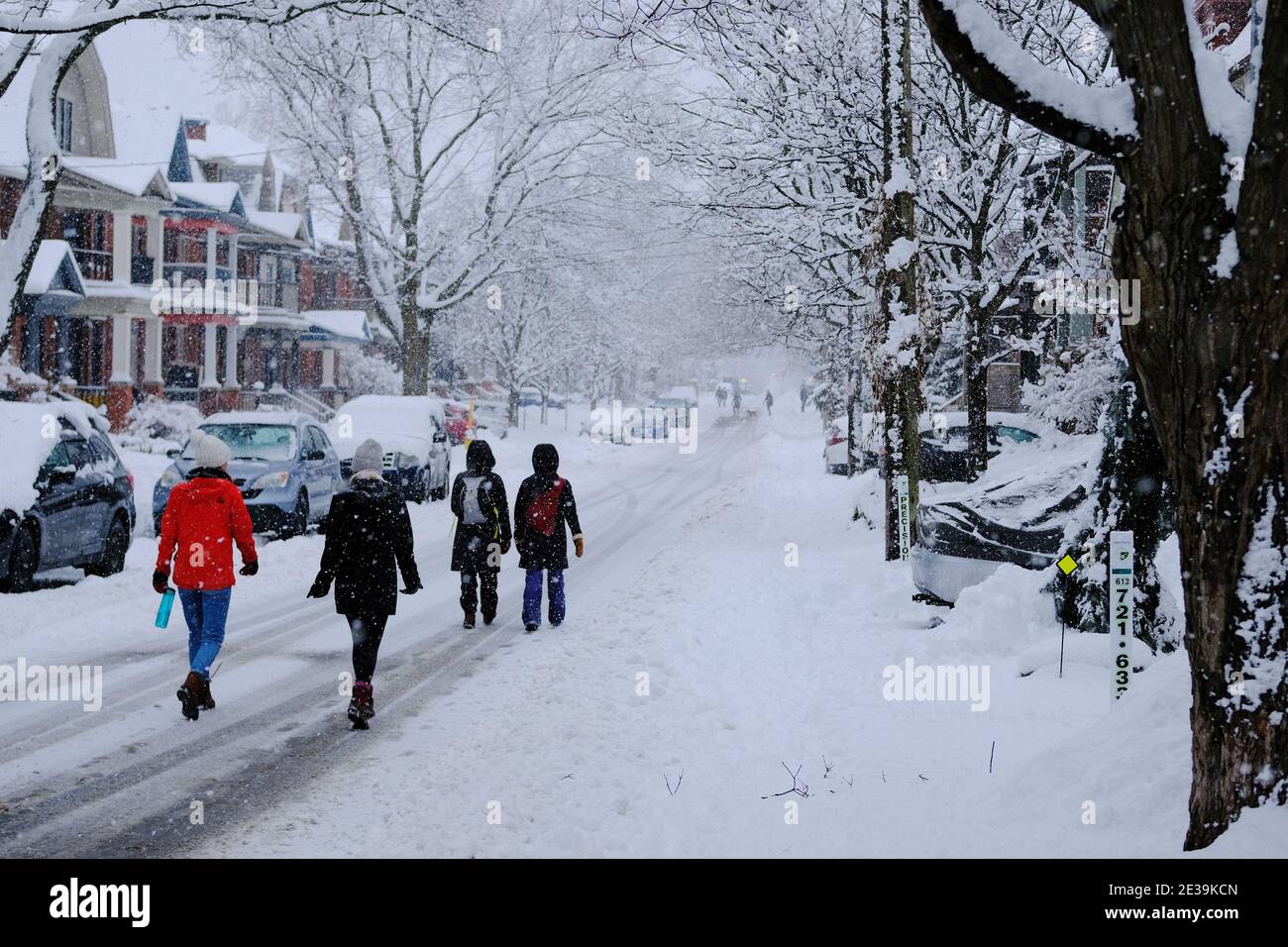 Snowy Ottawa - images from around town during a 25cm dump of snow. Pedestrians make their way down snowy streets in Ottawa, Ontario, Canada. Stock Photo
