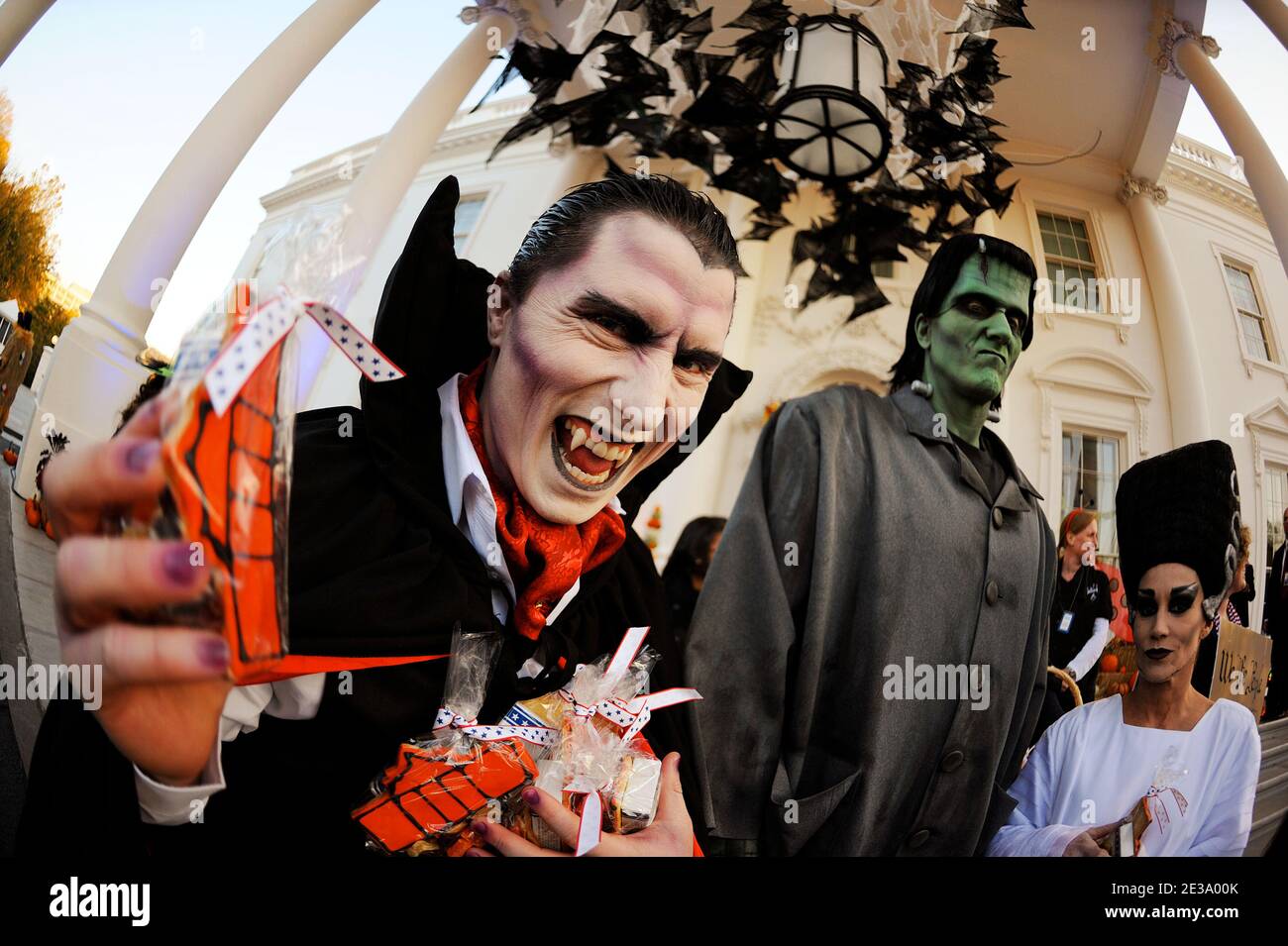 Monsters distribute candys for Halloween as people gather at the North Portico of the White House, in Washington, DC, USA on October 31, 2010. US President Barack Obama and First Lady Michelle Obama will greet trick or treaters at the North Portico of the White House to celebrate Halloween. Photo by Olivier Douliery/ABACAPRESS.COM Stock Photo