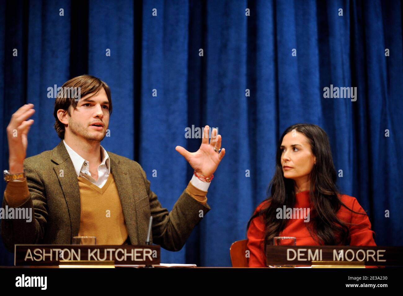 US actress Demi Moore and husband actor Ashton Kutcher address a press conference prior to the