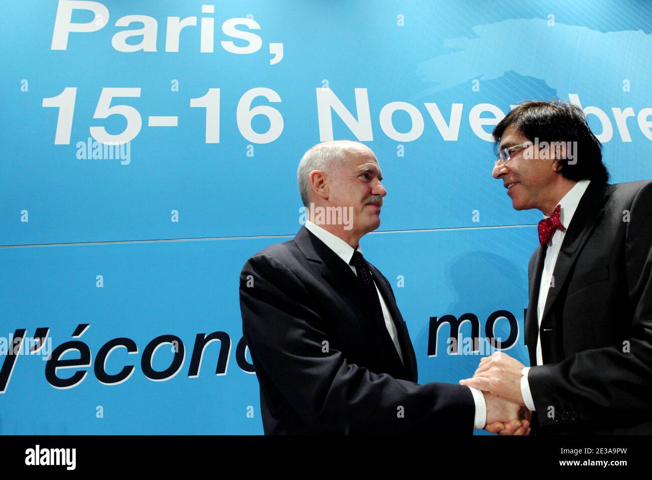 Greece's Prime Minister George Papandreou shakes to President of Belgium Socialist Party, Elio Di Rupo before a council meeting of the Socialist International in Paris, France, on November 15, 2010. Photo by Stephane Lemouton/ABACAPRESS.COM Stock Photo
